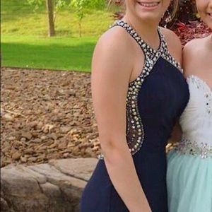 A size 9 prom dress worn for only 3 hours.